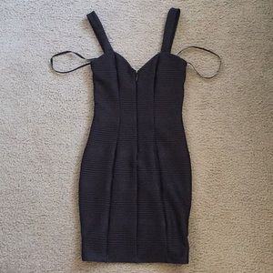 Bebe Black Zip front dress with back cut outs XXS